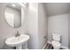Powder room featuring stand alone sink with modern fixtures and grey walls at 8629 Ensworth St # 113, Las Vegas, NV 89123