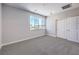 Bright bedroom with ample natural light, double door closet and carpet flooring at 8629 Ensworth St # 113, Las Vegas, NV 89123