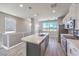 Bright kitchen featuring stainless steel appliances, gas range, an island and sink at 8629 Ensworth St # 113, Las Vegas, NV 89123