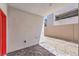 Covered patio with pavers and stone landscaping offers a relaxing outdoor space at 8629 Ensworth St # 113, Las Vegas, NV 89123