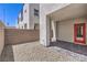Private outdoor patio with pavers and stone, perfect for relaxing and entertaining at 8629 Ensworth St # 113, Las Vegas, NV 89123