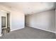 Bedroom with carpet, neutral walls, and access to an attached bathroom at 8629 Ensworth St # 114, Las Vegas, NV 89123