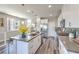 Beautiful kitchen showcases stainless steel appliances, a stylish backsplash, and a central island, perfect for cooking and entertaining at 8629 Ensworth St # 114, Las Vegas, NV 89123