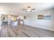 Open-concept design integrates the kitchen and living area, creating a harmonious space perfect for modern living and entertaining at 8629 Ensworth St # 114, Las Vegas, NV 89123