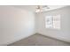 Bedroom with ceiling fan, carpet, and neutral color at 8798 Tom Noon Ave # 103, Las Vegas, NV 89178
