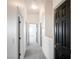 Hallway with carpet and dark trim on doors at 8798 Tom Noon Ave # 103, Las Vegas, NV 89178