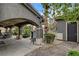 Covered patio with an outdoor kitchen and built-in grill at 9108 Ghost Mountain Ave, Las Vegas, NV 89129