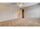 Neutral bedroom with large closet, ceiling fan, and carpeted floors at 9108 Ghost Mountain Ave, Las Vegas, NV 89129