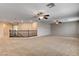 Large upstairs loft area with recessed lighting, ceiling fans, and neutral walls offers flexible living space at 9108 Ghost Mountain Ave, Las Vegas, NV 89129