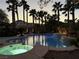 Resort-style pool with a spa, cascading waterfalls, and lush tropical landscaping perfect for outdoor enjoyment at 9108 Ghost Mountain Ave, Las Vegas, NV 89129