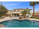 Beautiful backyard pool with ample patio space and lush landscaping, ideal for enjoying the outdoors at 9475 Castillana Ct, Las Vegas, NV 89147