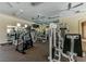 A gym filled with Paramount weight machines and treadmills for a complete fitness experience at 10229 Birch Bluff Ln, Las Vegas, NV 89145