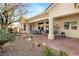 View of the back of the house showing the patio, landscaping, and architecture at 10548 Findlay Ave, Las Vegas, NV 89134