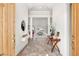 Bright foyer with tile flooring and views into the living area at 10548 Findlay Ave, Las Vegas, NV 89134