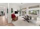 Bright living room with a neutral color palette, large windows, and an open layout at 10548 Findlay Ave, Las Vegas, NV 89134