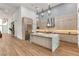 Spacious kitchen featuring an island, stainless steel appliances, and sleek cabinetry, perfect for the home chef at 10794 White Clay Dr, Las Vegas, NV 89135