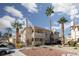 Attractive condominium building with manicured landscaping and stairs to upper units at 1333 Pinto Rock Ln # 202, Las Vegas, NV 89128