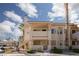 Condominium building featuring a mix of lower and upper units with stairway access at 1333 Pinto Rock Ln # 202, Las Vegas, NV 89128