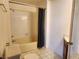 Standard bathroom featuring a tiled shower and tub combo, toilet, and vanity sink at 1904 Las Palmas Ln # 101, Laughlin, NV 89029