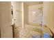 Cozy bathroom featuring a shower and tub combo, toilet, and vanity sink at 1904 Las Palmas Ln # 101, Laughlin, NV 89029