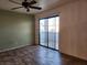 Bedroom featuring a sliding glass door, linoleum flooring, and neutral paint at 1904 Las Palmas Ln # 101, Laughlin, NV 89029