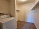 Laundry area featuring a washing machine and walk-in storage room at 1904 Las Palmas Ln # 101, Laughlin, NV 89029