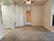 Living room featuring plush carpeting and view to another room at 1904 Las Palmas Ln # 101, Laughlin, NV 89029