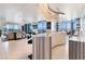 Open-concept design with marble bar, living space, floor to ceiling windows, and city views at 200 W Sahara Ave # 4101, Las Vegas, NV 89102