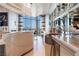 Contemporary bar features marble countertops, mirrored backsplash and gorgeous views of the city at 200 W Sahara Ave # 4101, Las Vegas, NV 89102