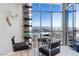 Cozy dining area features stunning views of the Las Vegas skyline through floor to ceiling windows at 200 W Sahara Ave # 4101, Las Vegas, NV 89102