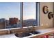 Kitchen sink and marble countertop with stunning city views visible through a large window at 200 W Sahara Ave # 4101, Las Vegas, NV 89102