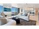 Bright living room featuring elegant furnishings, city views, and statement chandelier at 200 W Sahara Ave # 4101, Las Vegas, NV 89102