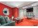 Vibrant living room with unique wallpaper, modern furniture, and a sleek glass table at 200 W Sahara Ave # 4101, Las Vegas, NV 89102