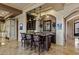 Charming bar area with stylish seating, custom cabinetry, and decorative accents, perfect for entertaining guests at 2540 Red Arrow Dr, Las Vegas, NV 89135