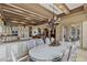 Dining area adjoining a gourmet kitchen and living area, complete with an elegant dining table at 2540 Red Arrow Dr, Las Vegas, NV 89135