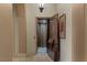 This home features a private elevator with a wood door and decorative lighting at 2540 Red Arrow Dr, Las Vegas, NV 89135