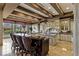 Bright kitchen featuring a large island with seating, modern appliances, and a view to the backyard at 2540 Red Arrow Dr, Las Vegas, NV 89135
