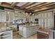 A stunning kitchen with custom cabinetry, granite countertops, and a spacious central island at 2540 Red Arrow Dr, Las Vegas, NV 89135