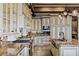 The kitchen features custom cabinets, stainless steel appliances, and a central island with a sink at 2540 Red Arrow Dr, Las Vegas, NV 89135