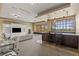 Large living room with entertainment center, bar, and stunning outdoor views at 2540 Red Arrow Dr, Las Vegas, NV 89135
