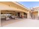 Spacious outdoor patio area with a staircase, fireplace, and a lovely seating area at 2540 Red Arrow Dr, Las Vegas, NV 89135