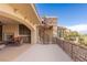 Open patio with a fireplace, seating area, and a staircase provides a relaxing outdoor space at 2540 Red Arrow Dr, Las Vegas, NV 89135