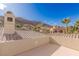 A rooftop deck offers gorgeous views of surrounding mountains, palm trees, and beautiful skies at 2540 Red Arrow Dr, Las Vegas, NV 89135