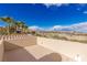 A rooftop deck with scenic views of palm trees, golf course, and the city skyline at 2540 Red Arrow Dr, Las Vegas, NV 89135