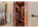 Walk-in shower featuring ornate tile work at 2540 Red Arrow Dr, Las Vegas, NV 89135