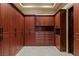 Spacious walk-in closet boasts custom wood cabinetry and ample storage space at 2540 Red Arrow Dr, Las Vegas, NV 89135