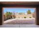 Backyard with brick pavers, a block wall, and desert landscaping at 2824 Shadows Edge Ct, Henderson, NV 89052