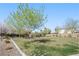 Serene community park featuring green lawns, walking paths, and shade trees, ideal for recreation at 2824 Shadows Edge Ct, Henderson, NV 89052