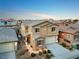 Two-story home featuring a well-manicured front yard with desert landscaping and a covered porch at 2824 Shadows Edge Ct, Henderson, NV 89052