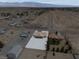 Extensive aerial image captures the surrounding desert landscape and community design at 3080 S Prairie Ave, Pahrump, NV 89048